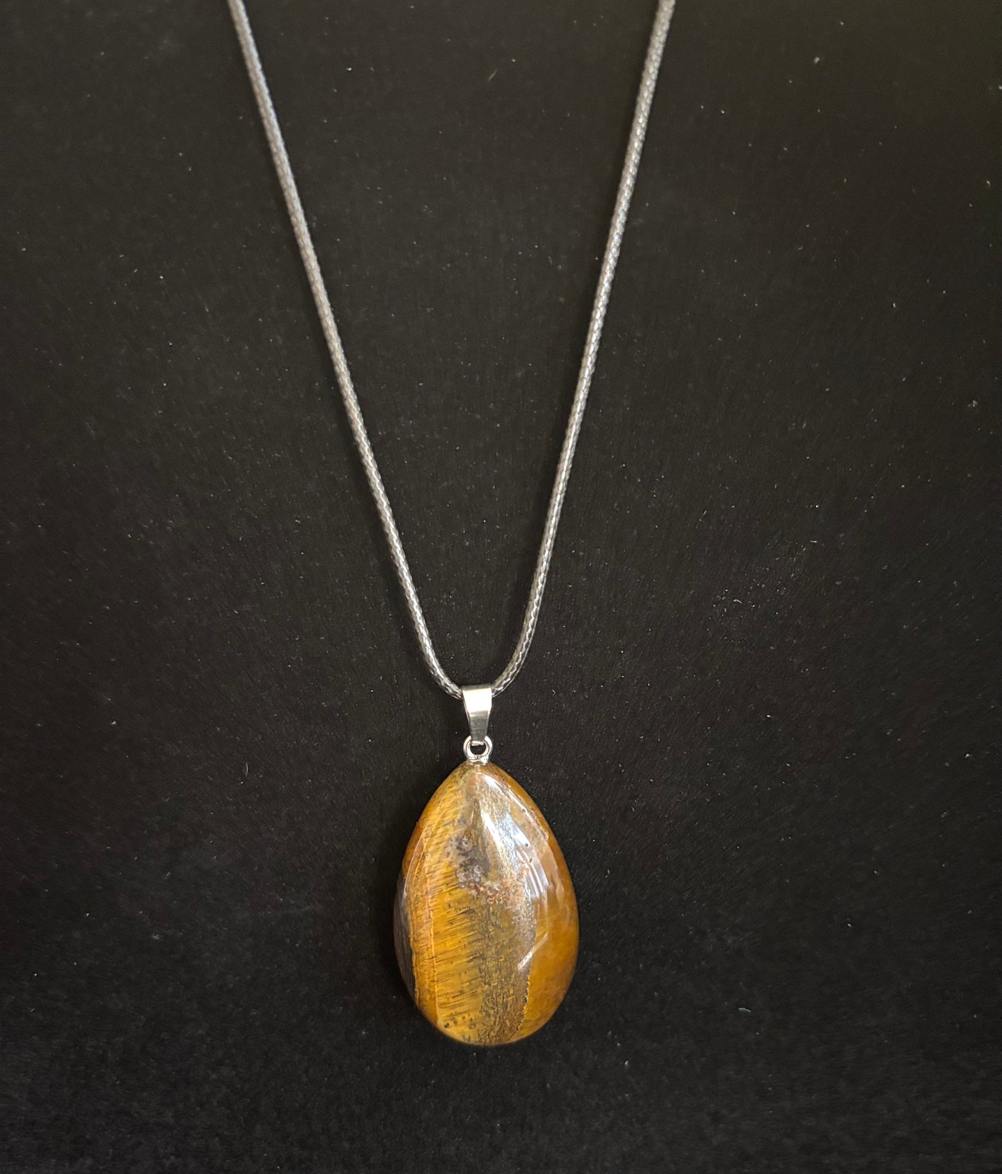 Grounded Elegance: Natural Tiger Eye Leather Pendant Necklace on Leather Rope